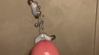 Close-up ongoing cum spurts in slo mo 