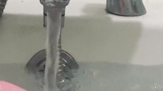 My feet in the bath playing with my rubber duck 