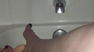 Foot goddess gives dildo a lazy foot job