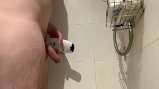 Washing a hard cock in the shower