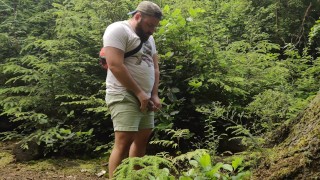 Huzzbearz bear pissing in the woods