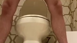 Cumming on hotel bathroom floor