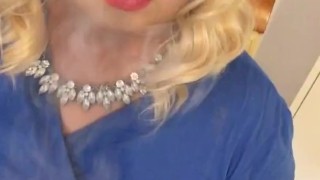 Sexy blonde crossdresser smokes and shows of clitty