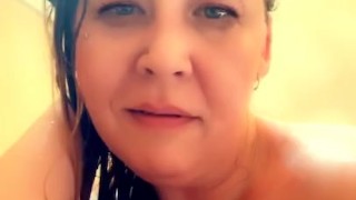 Bath time with wet milf