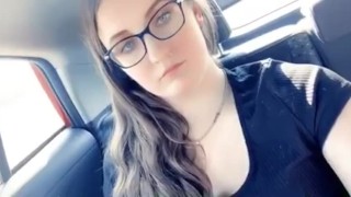 Brunette college girl plays with herself in a lyft car 