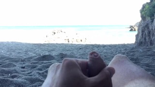 Slow motion cumshot on public beach