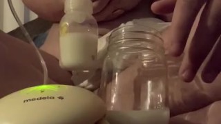 Milkymama using a pump for 13 straight minutes filling a mason jar to the brim 