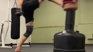 Mucsle stud kickboxer with perfect feet