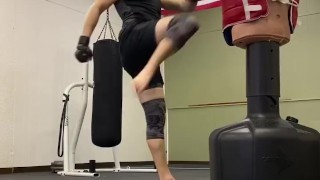 Mucsle stud kickboxer with perfect feet