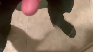 Horny college guy plays with thick dick in front of mirror