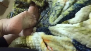 My feet over the counterpane, showing soles - part 3