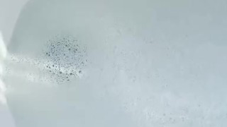 Cute toes in a bubble bath