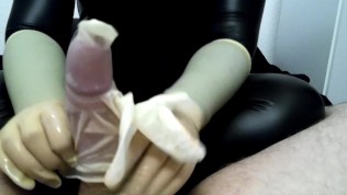 Milking in a White Latex Glove 