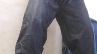Hunk spews out huge load on the floor, in pvc boilersuit and rubber gloves