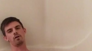 Pissing all over myself before desperately trying to cum and finally licking up my thick cum!