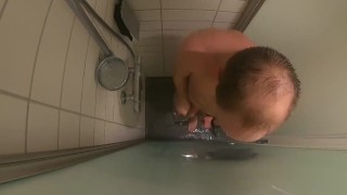 peeing and jerking off in hotel shower