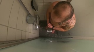 peeing and jerking off in hotel shower