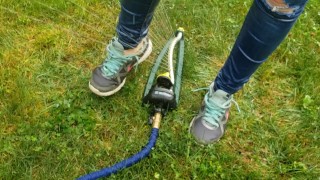 Wetting My Jeans Into sockless Shoes then soaking in the sprinkler