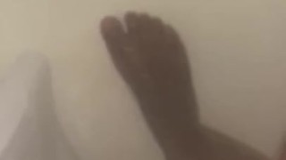Size 12 male feet, while in the shower.