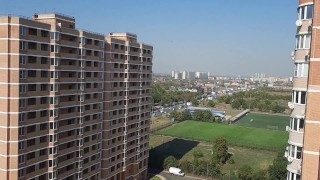 I dance and masturbate on the balcony, in full view of the neighbors from the high-rise building