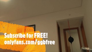 Amateur stud working out at home and flexing his muscles