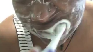Brushing my teeth and scraping my tongue 