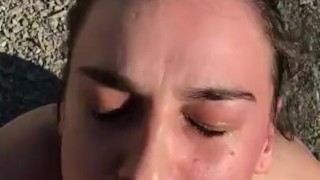 tattooed girl gives blowjob at beach 