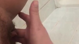 PEE DESPERATION LEADS TO PISSING IN SHOWER AND CUMMING