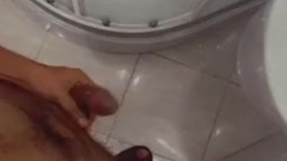 Playing with my dick in bathroom 