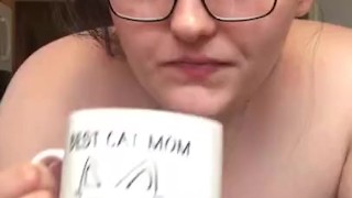 Cute MILF drinking morning coffee being fucked from behind