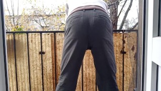 Risky public pissing on the balcony. Neighbors are watching!