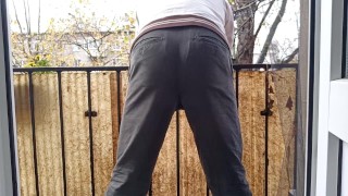 Risky public pissing on the balcony. Neighbors are watching!