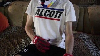 Twink guy in a mxhelmet jerks off and strokes the body