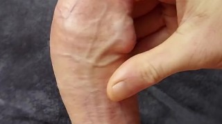 Slipping a finger under my foreskin