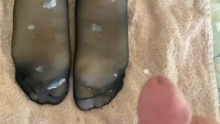 Cumming onto nylon feet...