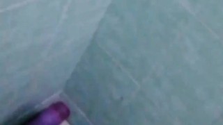 Jerking off while taking a shower