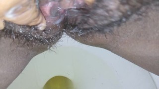 Peeing with cum and a close up pussy