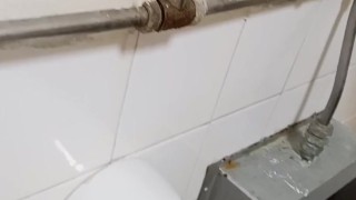 Big cock piss at urinal