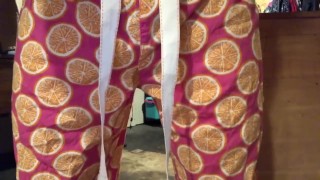 Girl pissing pajamas on the floor