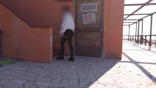 Wife masturbates until she cums behind a public beach near people walking