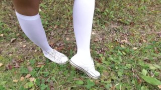 Schoolgirl in white knee socks walk nature foot feet fetish under skirt