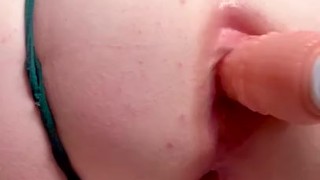 Quiet moans from cutie while machine fucks her tight asshole