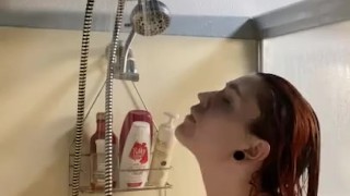 Hot babe suds up in shower
