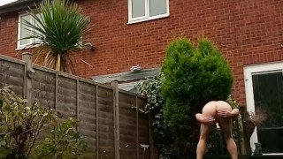 Arse spread nude in garden swinging extreme ball weights