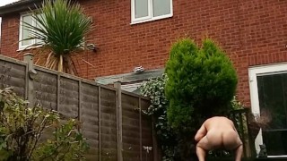 Arse spread nude in garden swinging extreme ball weights