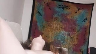 Curly brunette fucks herself on her couch with her new bullet 