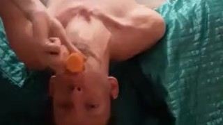 Skinny teen Deepthroating a big fat carrot while upsidedown (turn up the volume)