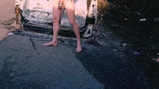 Hanging out beside burnt out van 