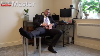 DILF in suit and tie jerks his uncut cock before online meeting cums on formal shoes PREVIEW