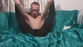 Skinny baldy teen wears leggings and puts his legs behind hi head and fingers his ass